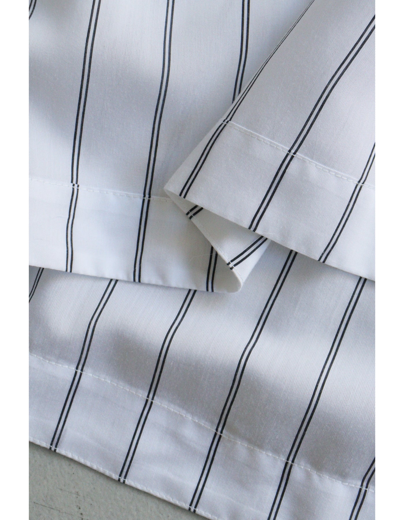 【ACUTA】ストライプドルマンパールボタンブラウス