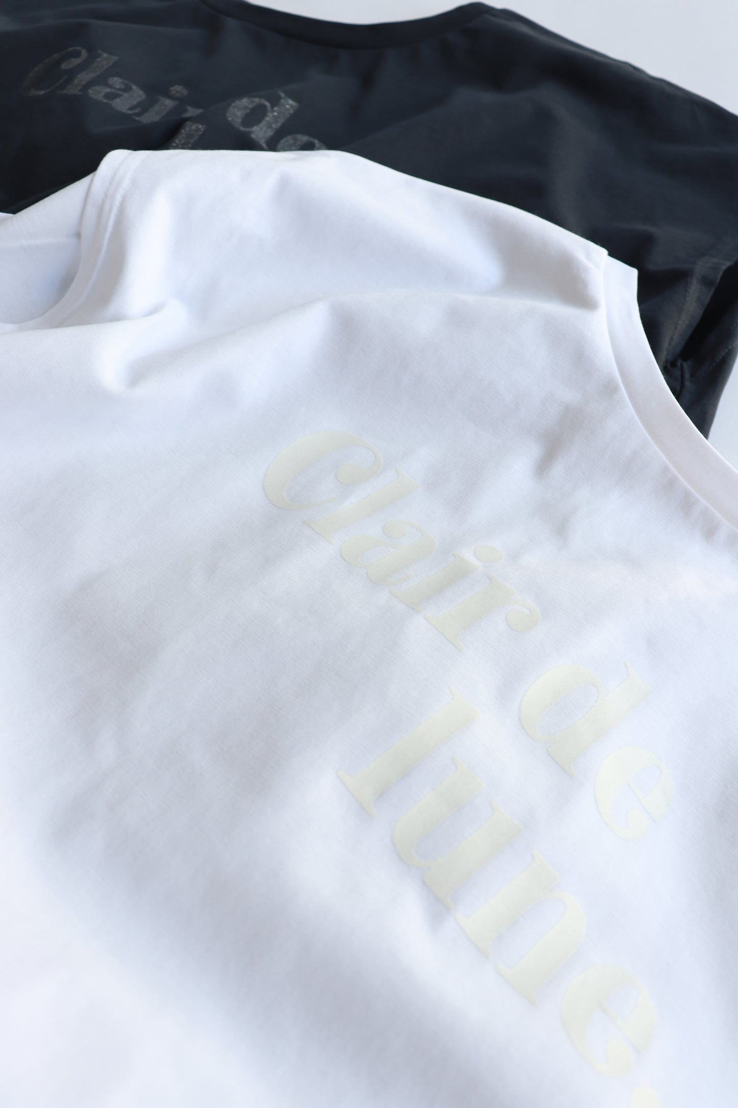 【ACUTA】グリッタープリントTシャツ